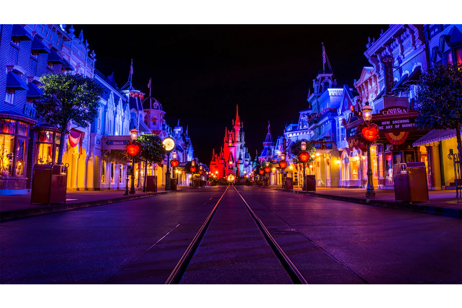 Disney's main street decorated for halloween at night 